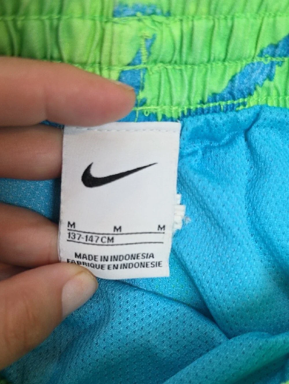 Nike Neon Green Swim Trunks with Blue Swoosh Print